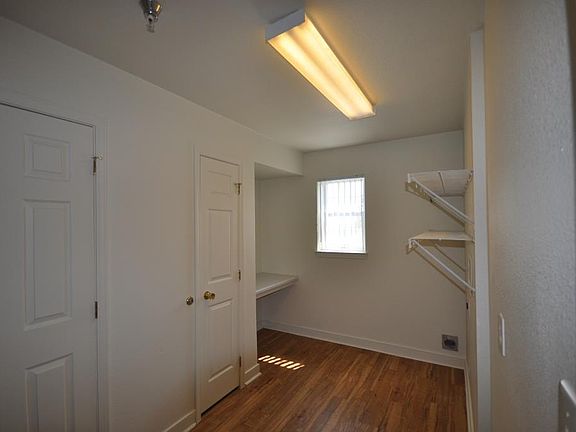 Laundry room with storage