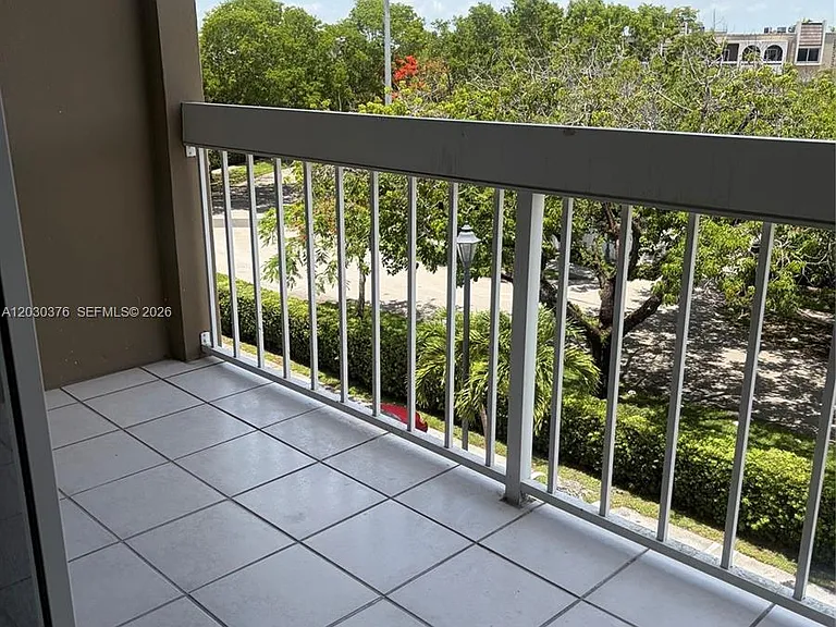 7732 Camino Real #F-404 — Photo 1