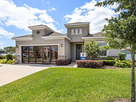 This beautiful show home includes 3 bedrooms plus a den, 2.5 baths, and an oversized 2-car garage g