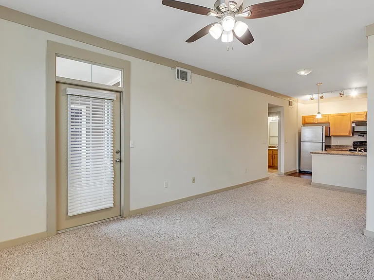 Cozy Carpeted Floors at Riverside at Rockwater in North Little Rock, AR