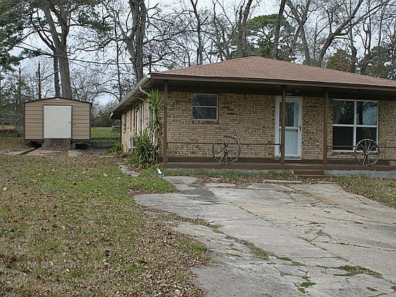 Side view showing storage building