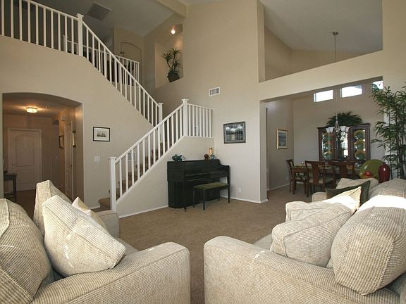 Dramatic Vaulted Ceilings w/Double Staircase!