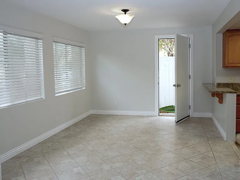 Dining Area with Side Door to Private Patio