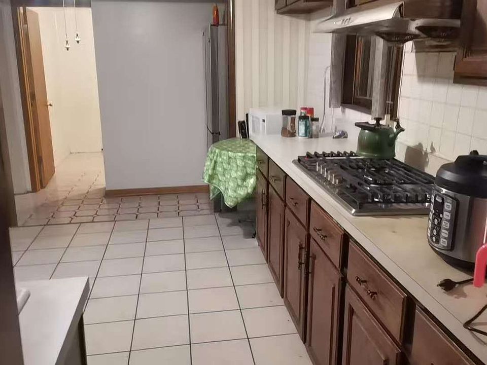 1st image of 312 W 23rd Pl Unit 1