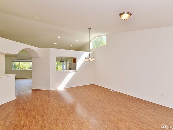 Vaulted ceilings in your living room, Kitchen and dining room with plenty of natural lighting