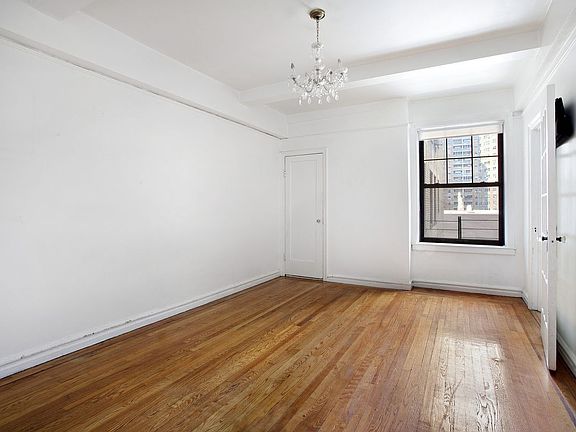 3rd image of 141 E 3rd St APT 8A