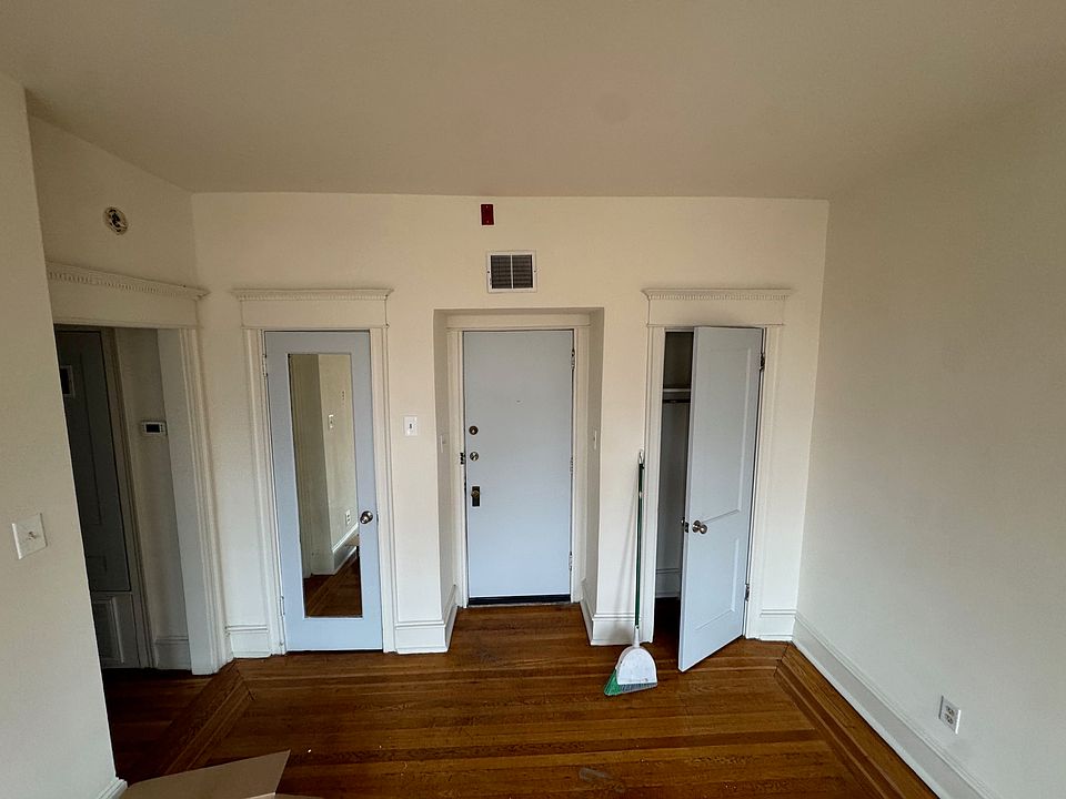Center door coming from building hallway closet on both sides of main door. Left middle is the hallway to bedroom.