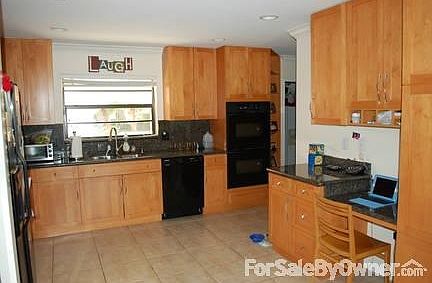 Kitchen
						:
						All new cabinetry and appliances. Double oven!