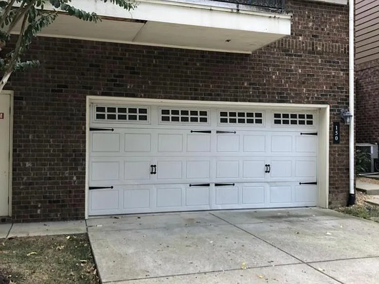 Two Stall garage and Parking pad!