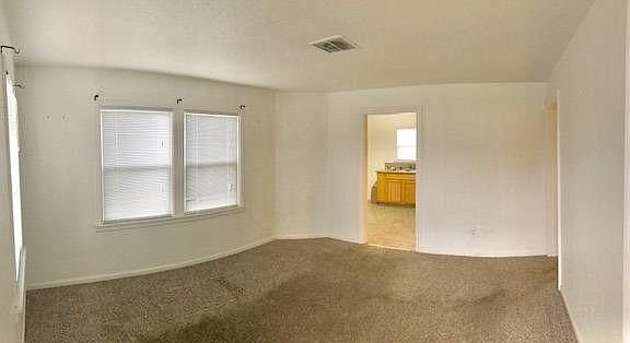 Living Room *No Longer has carpet, hard wood floors*