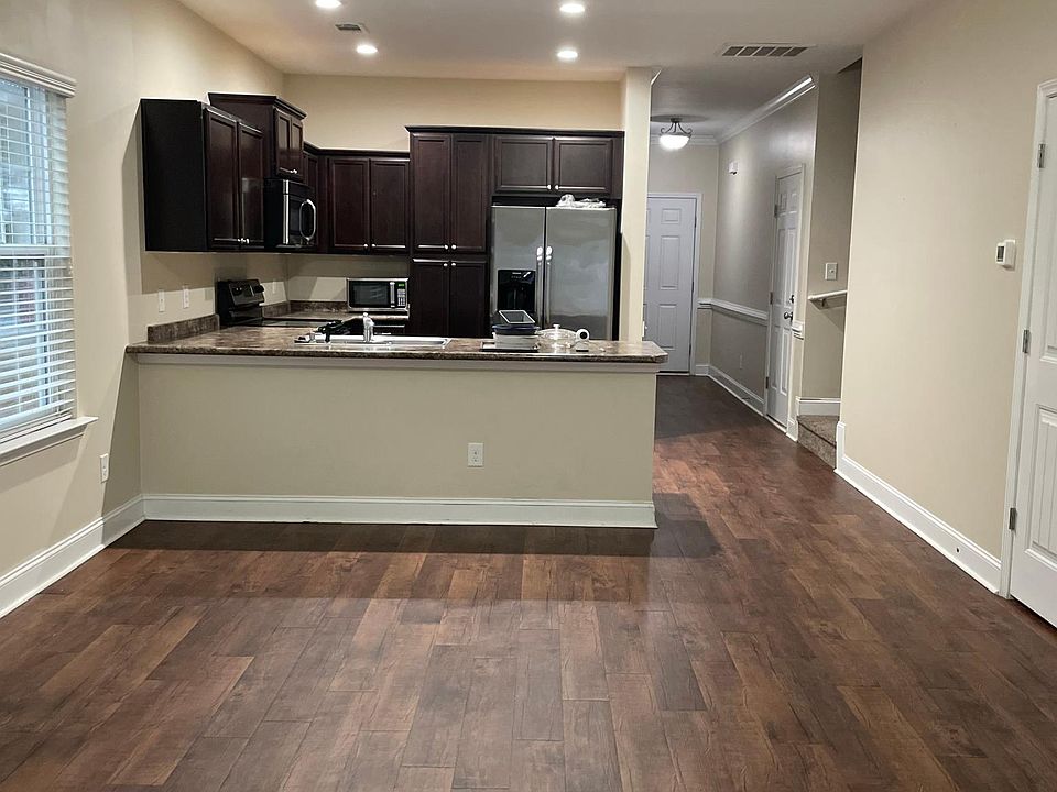 Large Spacious Living Room - Open Concept Half bathroom open to common area on main floor.