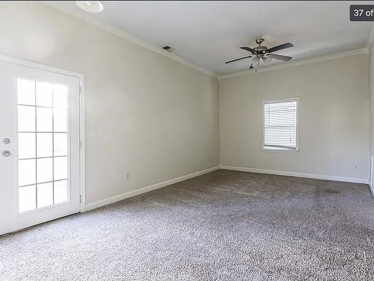 Master Bedroom with French Doors to Back Yard Patio