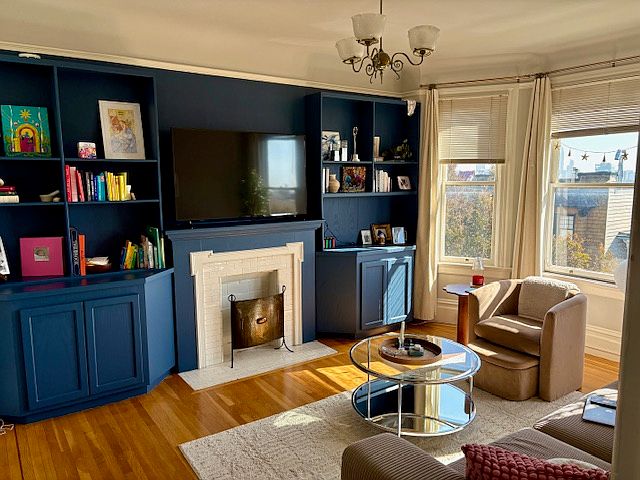 Living room with bay windows