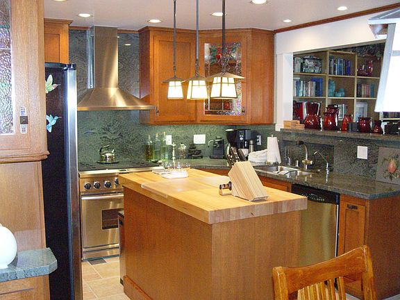 Island has warming drawer & wine cellar