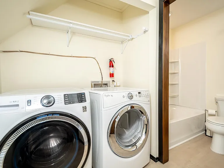 Upstairs laundry & bathroom (washer & dryer are furnished).