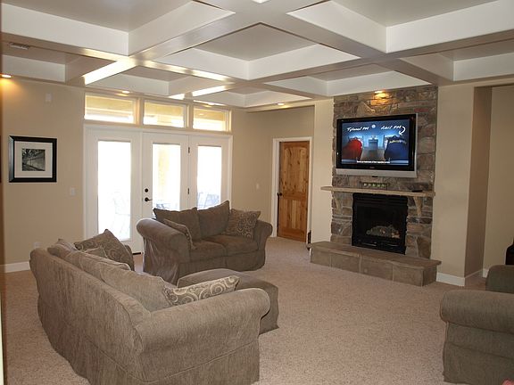 Family Room w/ Fireplace & Unique Ceiling