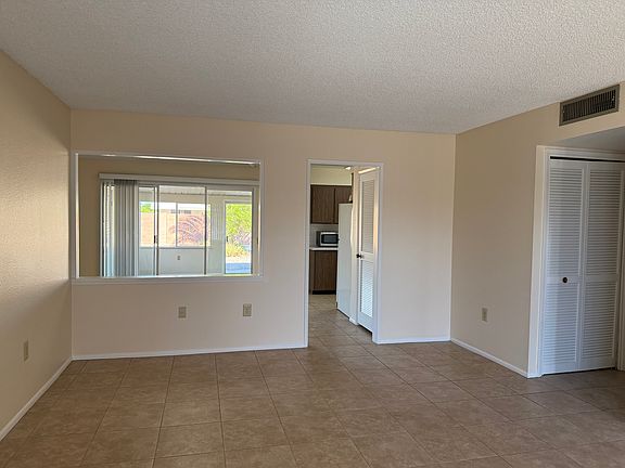 Living area - pass thru to dining area