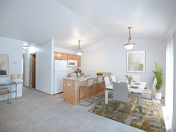 High Vaulted Ceilings & Brushed Nickel Lighting Fixtures
