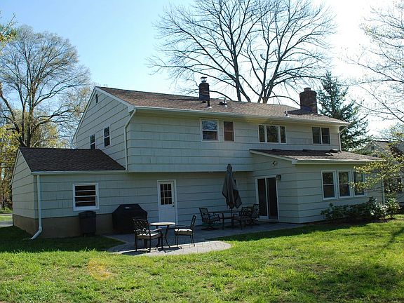 Back view, walkout and patio