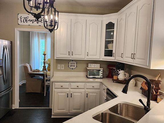 Gourmet Kitchen with Quartz Counter Tops overlooking the formal dining room