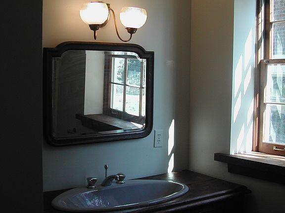 Bath room with antique mirror