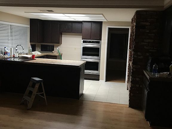 Looking from den into kitchen