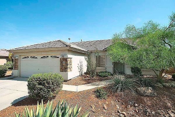Front view - with beautiful and easy to maintain desert landscaping