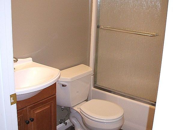 Full bathroom downstairs with ceramic