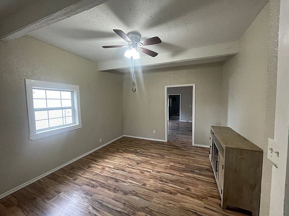 View from living room/front door into bedroom.