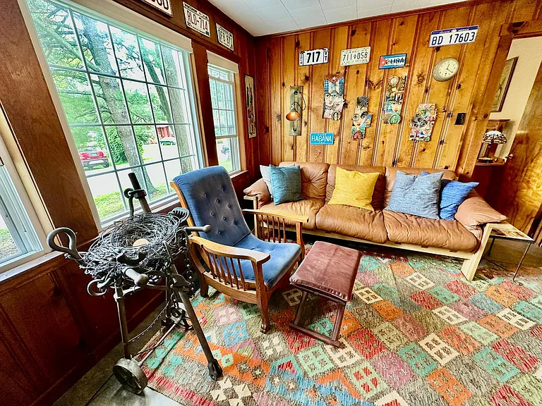 High quality furniture featuring leather and comfortable vintage items creates a relaxing mojo to enjoy!