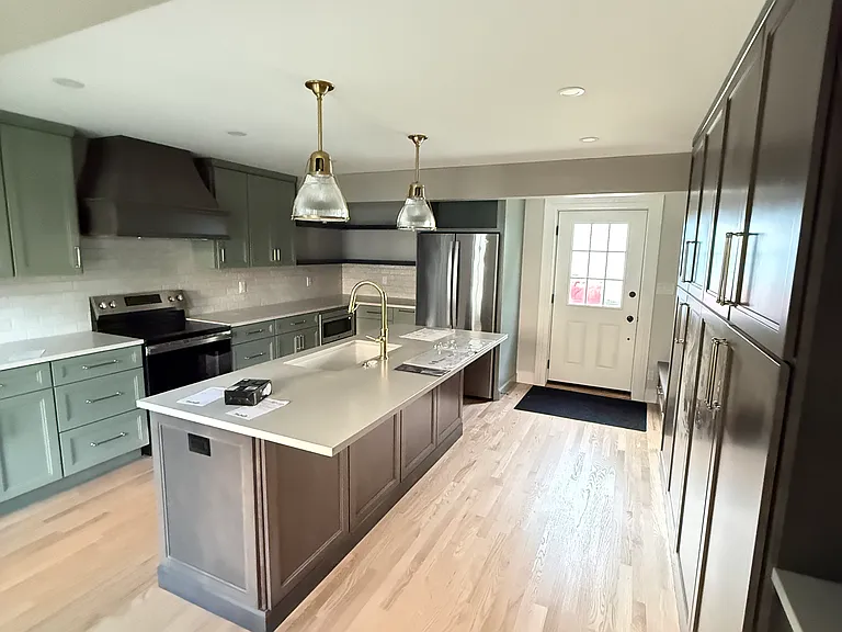 Kitchen. Door leads to the driveway.