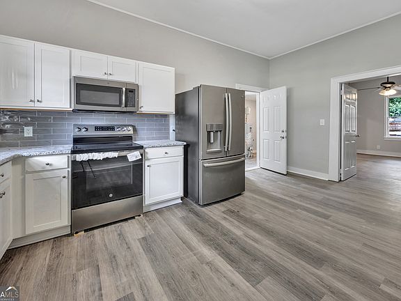 5th image of 6171 Collins St NE