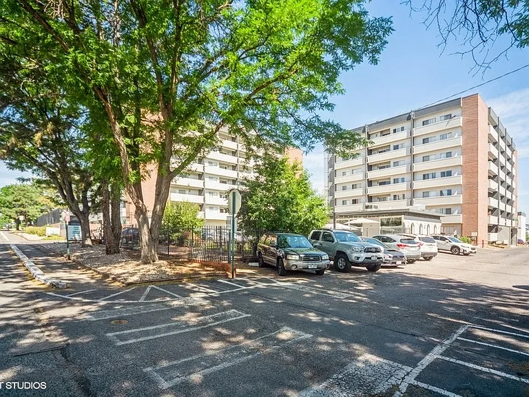 Shaded parking and mature trees in a central location