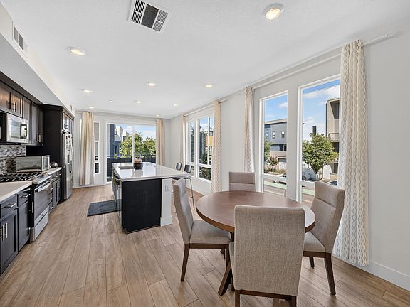 Open-concept dining and kitchen