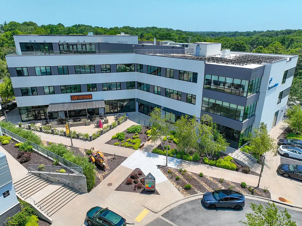 Take in the landscaped courtyard, outdoor seating, and modern architecture at Farmers Park Apartments. Schedule a tour today.