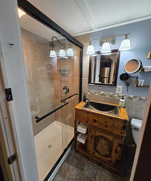 Beautiful custom bathroom with glass door shower