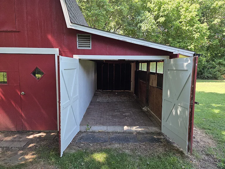The workshop off to the side of the barn