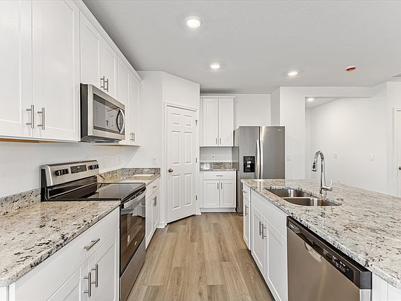 Kitchen in the Daphne Floorplan at 2514 Moose Trail in Deer Run at Crosswinds