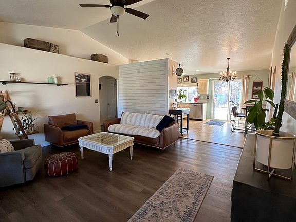 Front room with vaulted ceilings and plenty of natural light