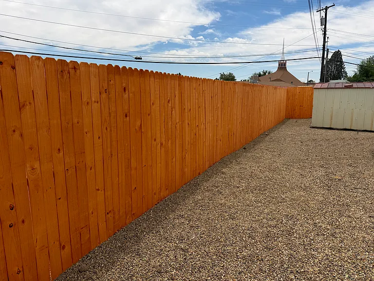 Enjoy added privacy with a brand-new fence that beautifully defines the outdoor space.