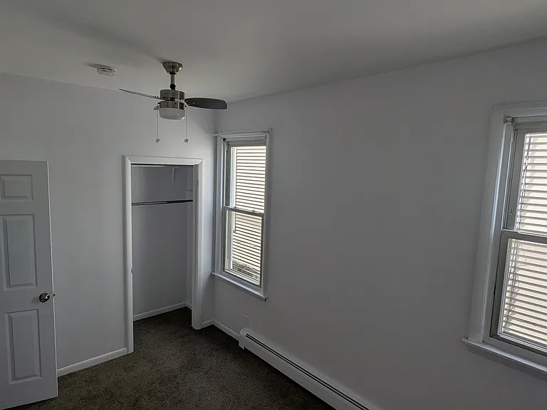 Master Bedroom with 2 windows, closet, new fan