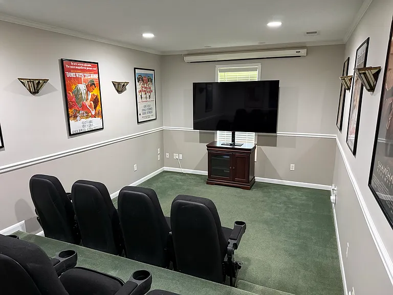 Media Room with Home Theatre Seating and 75 Inch LG HDTV