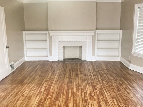 Living Space -- Features Gorgeous Wood Floors and Built-In's