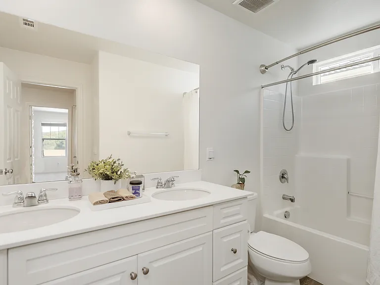 Upstairs Full Bathroom: Shower/Tub, Dual Sinks