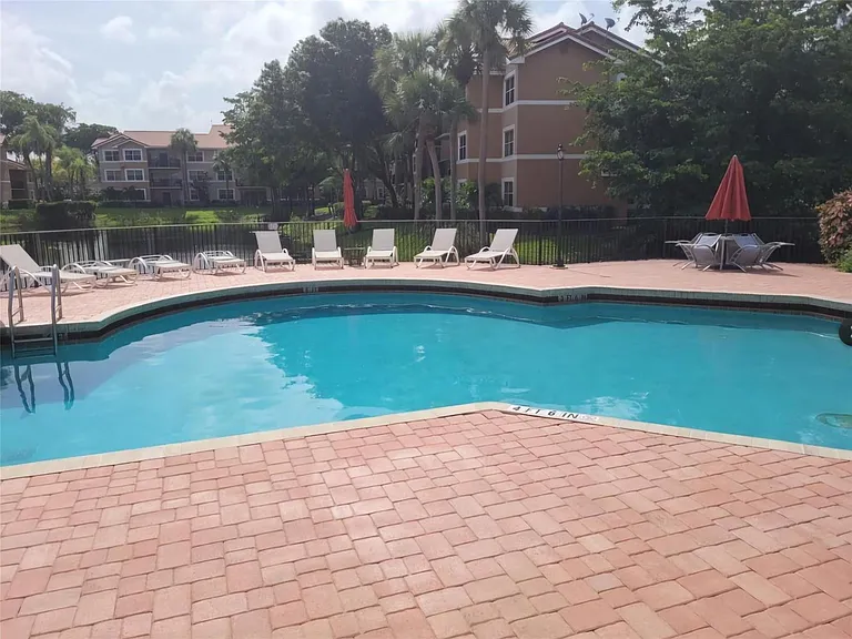 8741 Wiles Rd #305 — Photo 19