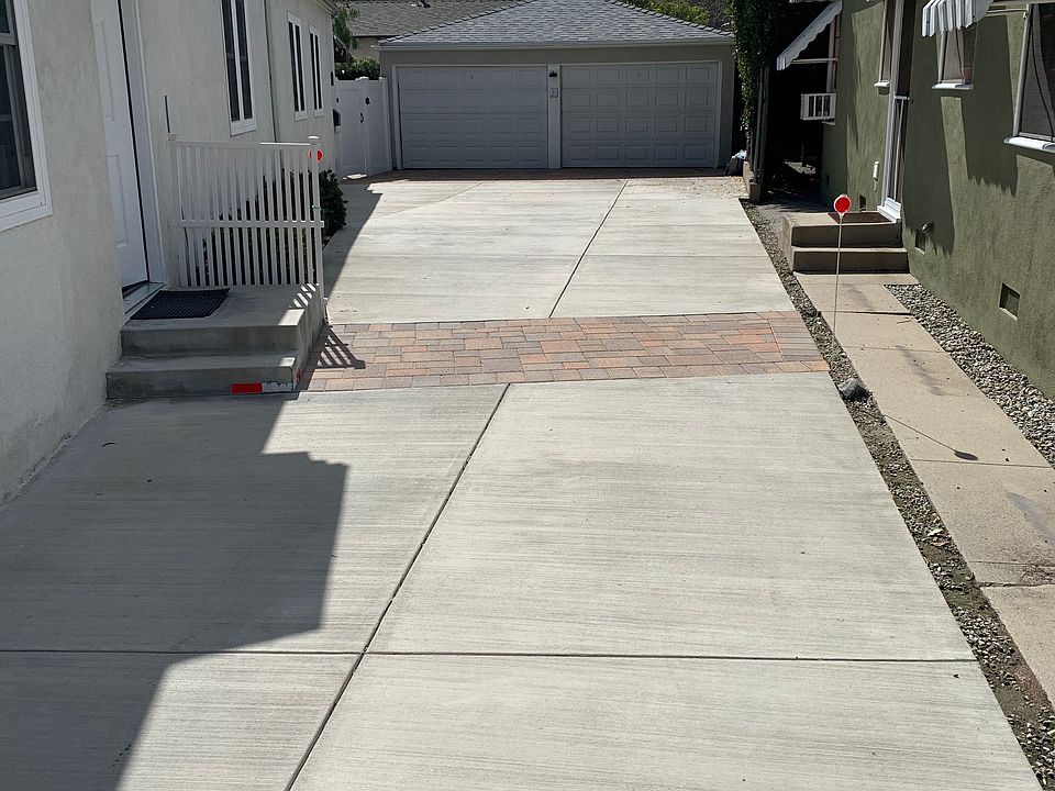 apt-A entry steps. Apt-A parking for 2 cars one in garage on right side- 
 one tandem parked directly behind