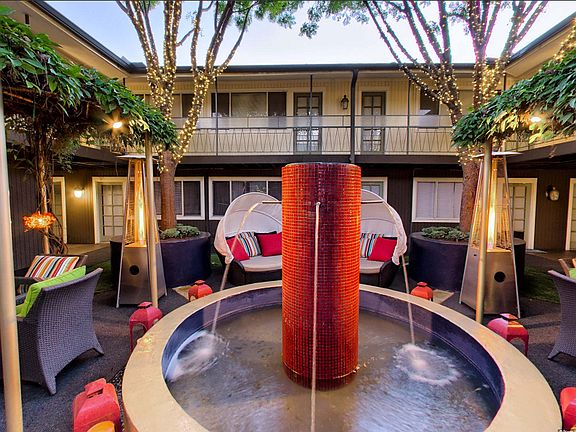 1001 Grigsby - RALEIGH CLAYTON Courtyard Night