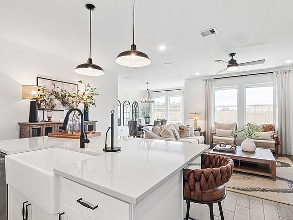 Kitchen with white apron-front sink