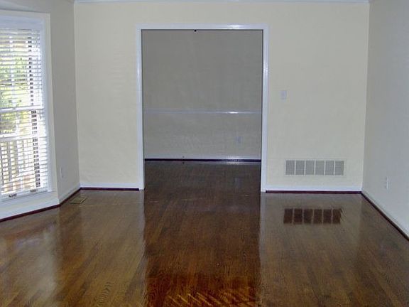 View of foyer from dining room through living room.
