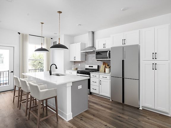 Kitchen w designer finishes and open floor plan